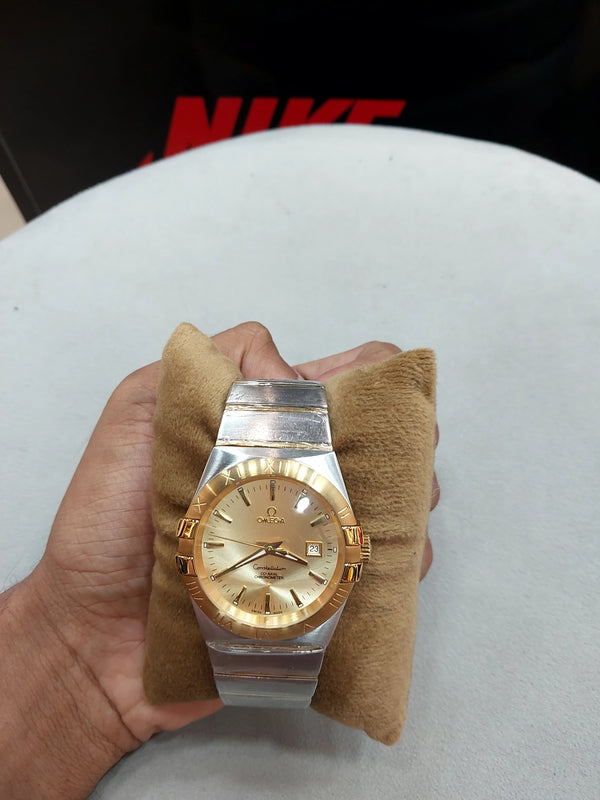 OMG Co-axial Golden UA Watch